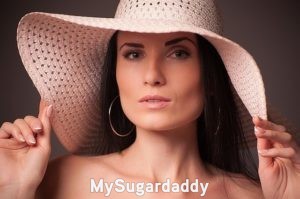 Beneficios de tener una Sugar Baby: Es un retrato de una mujer joven y atractiva. Tiene una piel perfecta y una mirada profunda. Los beneficios de tener una Sugar Baby es poder tener a alguien tan bella como ella de compañía. 